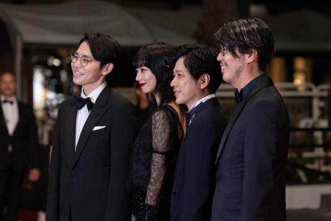 The Exit 8 team walks the red carpet at the 78th Cannes Film Festival